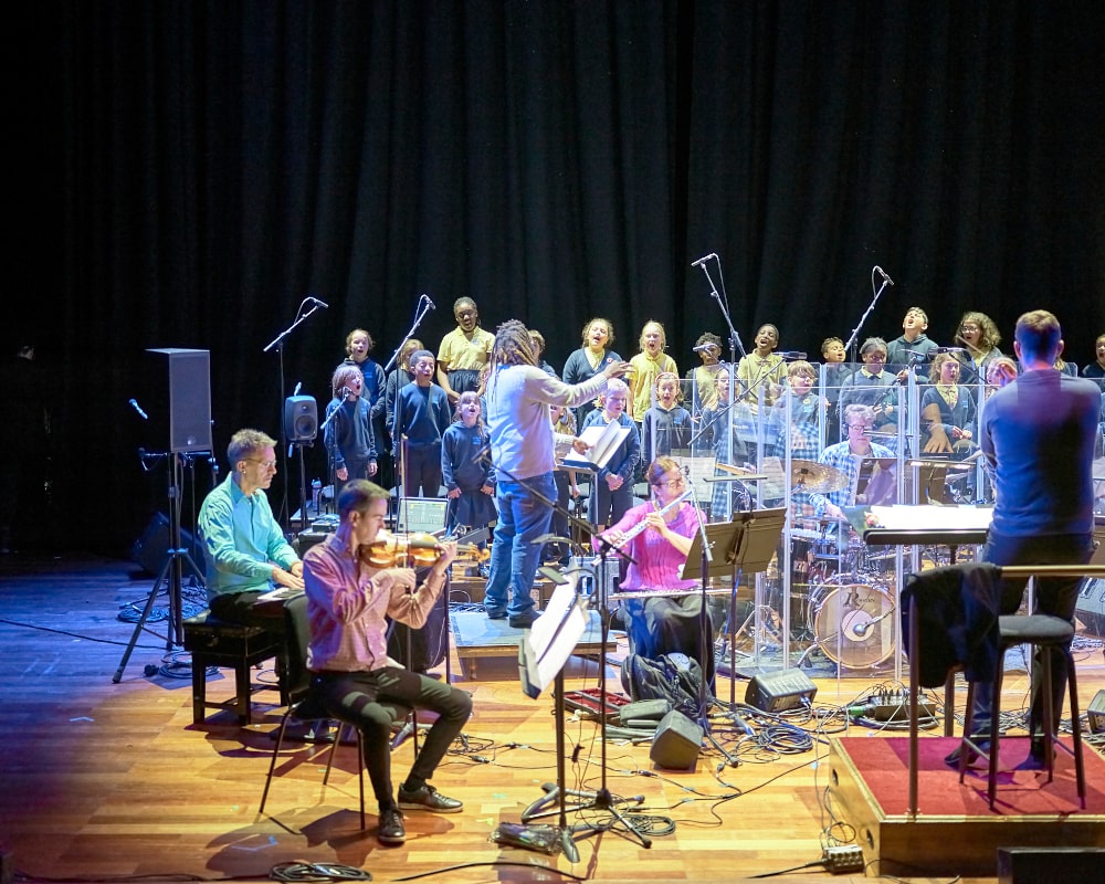 London Sinfonietta and children from the Belham Primary School on stage at the Southbank Centre