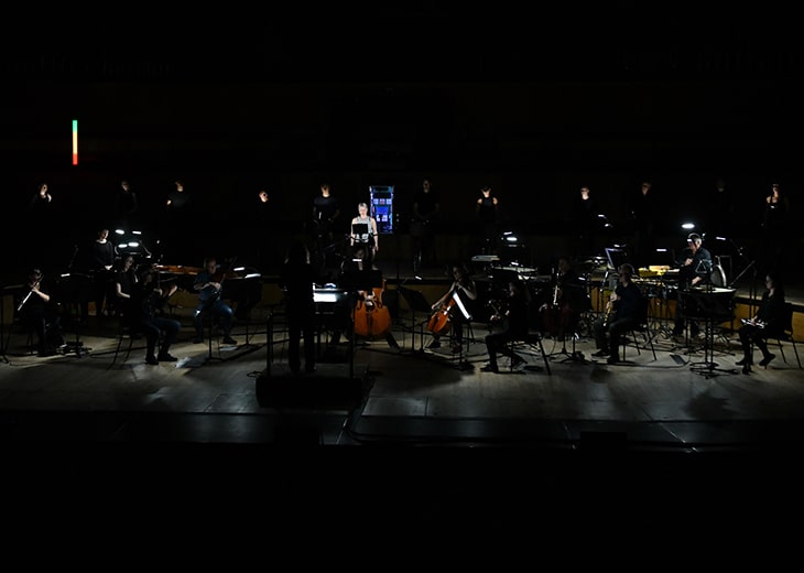 An image of London Sinfonietta musicians and cyclists at the Houses Slide concert