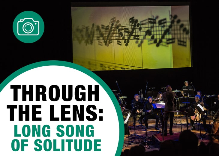 The London Sinfonietta performing at the Southbank Centre, with a large screen in the centre showing a film created by Nicole Lizee