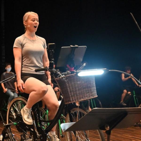 Soprano Jessica Aszodi in cycle-powered concert Houses Slide