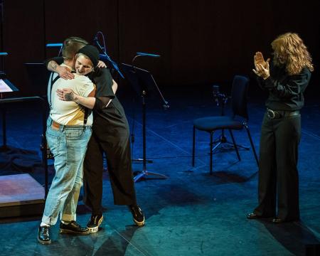 Composer Alicia Jane Turner and soprano Ella Taylor hugging at the end of the Then & Now concert
