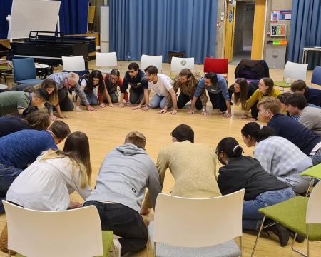 A group of students taking part in a teacher training workshop at the Institute of Education