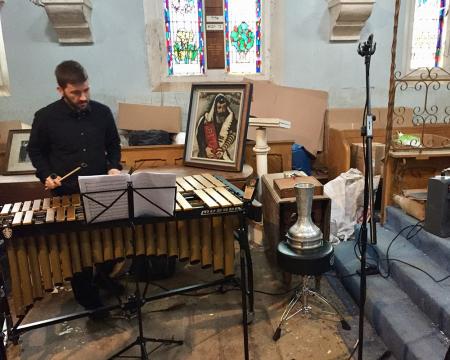 An image of a London Sinfonietta percussionist playing in a synagogue