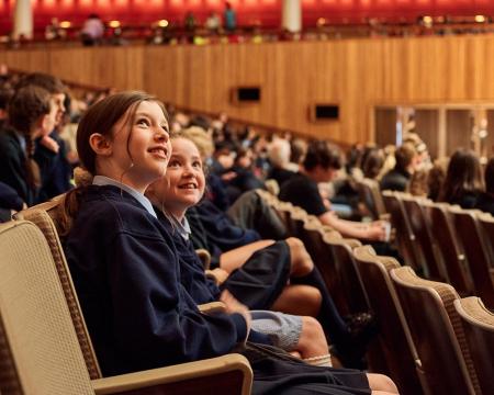 A close up shot of school children watching a London Sinfonietta concert
