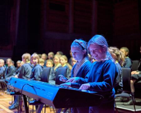 School pupils rehearsing for a concert