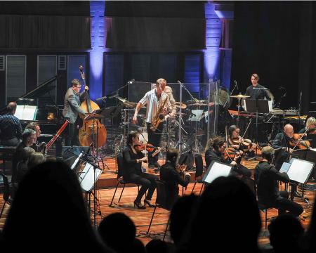 Marius Neset on stage with London Sinfonietta