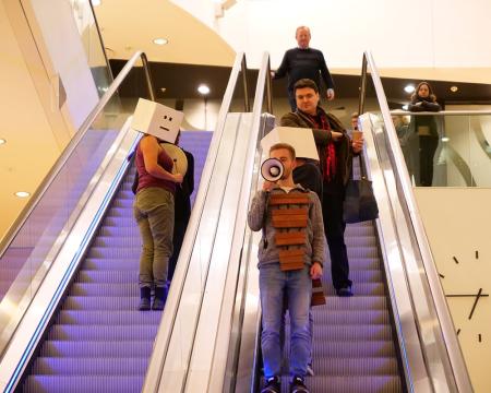 London Sinfonietta musicians performing on the escalators at Kings Place