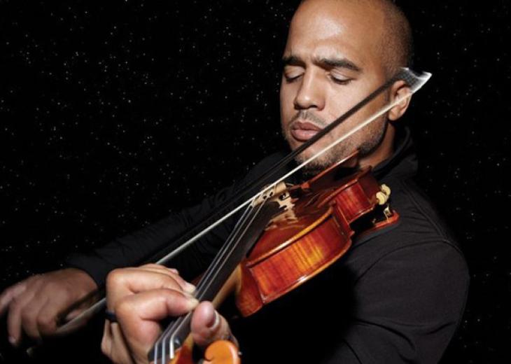 Daniel Bernard Roumain playing violin