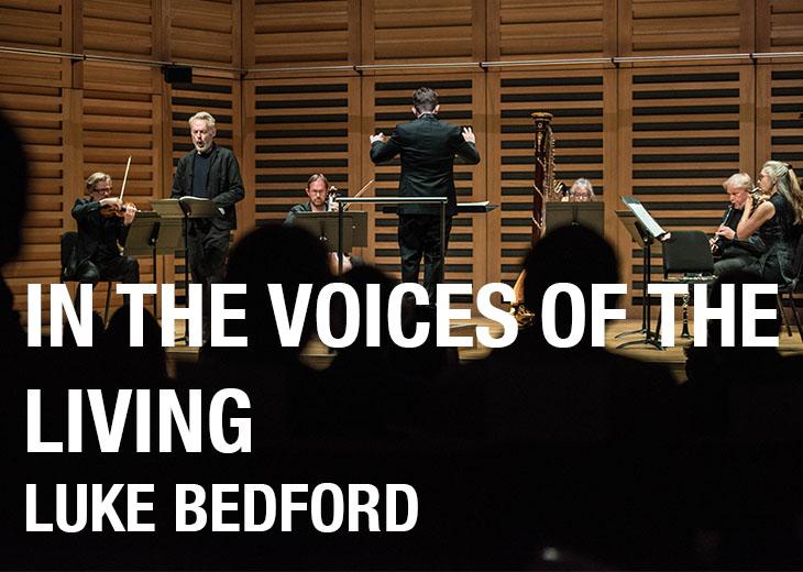 Front on image of the performance of in the voices of the living 
